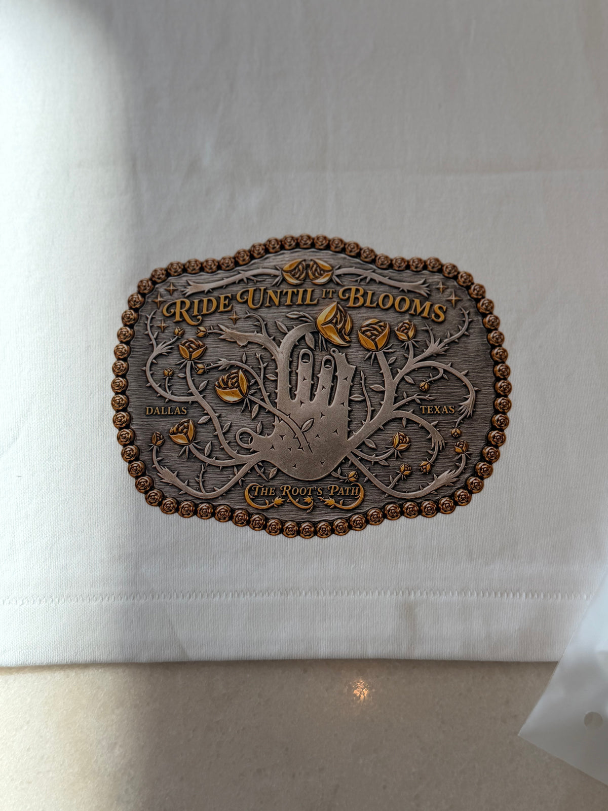 THE BUCKLE TEE