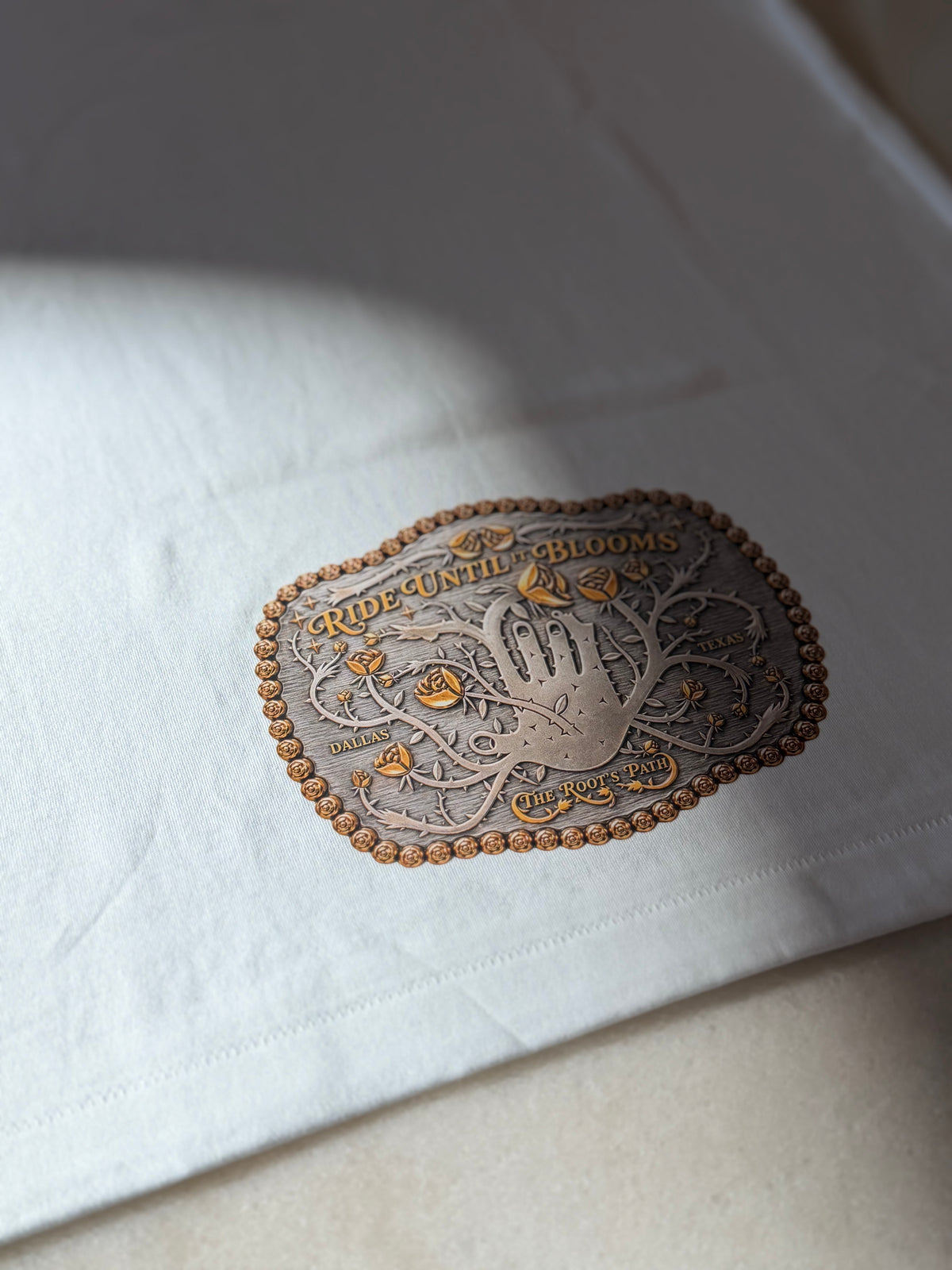 THE BUCKLE TEE